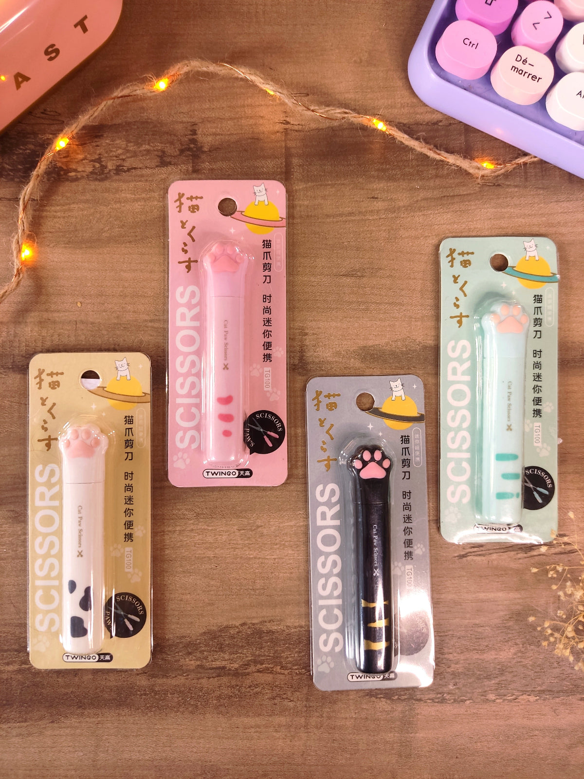 Ciseaux kawaii en forme de patte de chat avec capuchon pour la rentrée.