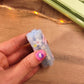 Gomme kawaii en forme de fleur de sakura bleuepour la rentrée scolaire.